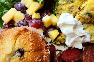 Rainbow Chard and Peppered Salami Frittata with purchased blueberry muffins, grape and fresh pineapple salad, and sauteed fingerling potatoes.